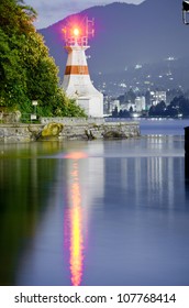 lighthouse with water reflection