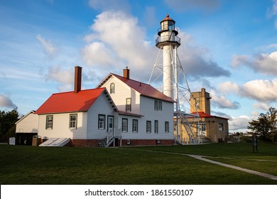 The Lighthouse At Whitefish Point In Michigan.  It Was Near Here In Lake Superior That The Ore Freighter Edmund Fitzgerald Sank During A Ferious Storm November 11, 1975.