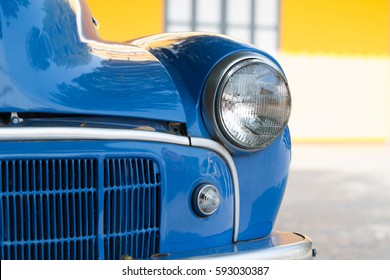 Lighting of blue antique car.