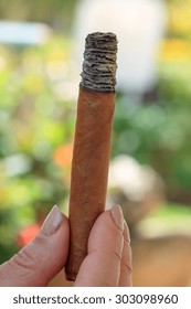 lighting a cigar close-up. Shallow depth of field.