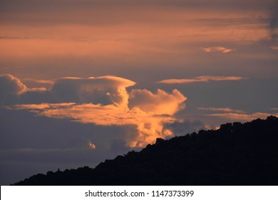 lighting cloud sky in sunset time is switch mountain shape. 