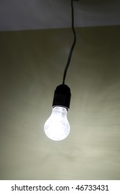 Lighting Dirty Electrical Lamp Hanging On Cable