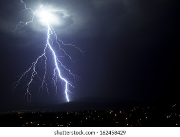 Lighting during storm hits a forest - Shutterstock ID 162458429