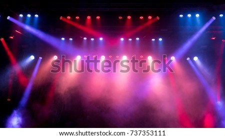 Lighting equipment on an empty stage. Red and blue.