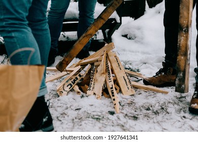 Lighting a fire in the forest in winter