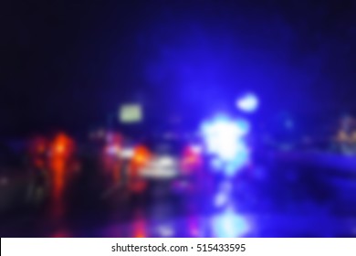 Lighting Of Police Car At Night During Accident On The Road When Raining. -blurred Picture.