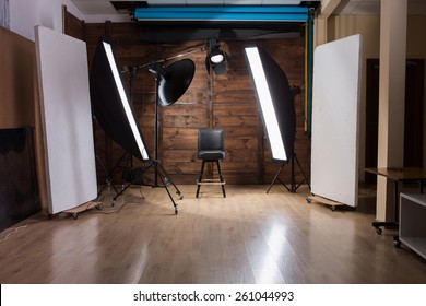 Lighting Set Up In Photostudio With Wooden Background