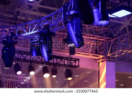 Lighting truss structures and professional stage light fixtures. Selective focus.