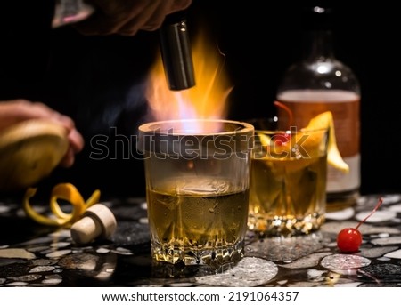 Lighting wood chips in a smoker for an old fashioned cocktail.  商業照片 © 