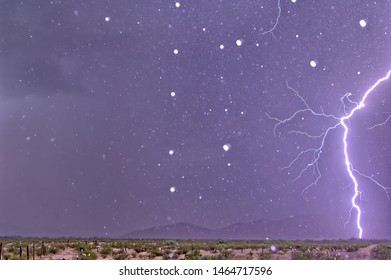 A Lightning Bolt Striking Only 1000 Feet Away. The White Dots In The Image Are Rain Drops Frozen In Midair By The Strobe Light Effect Of The Lightning Bolt. Taken During The 2015 Monsoon In Arizona.