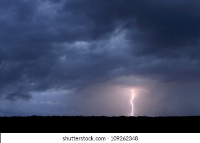 Lightning In The Cloudy Sky.