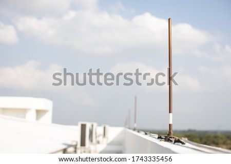 lightning copper rod and cable on roof construction concept background