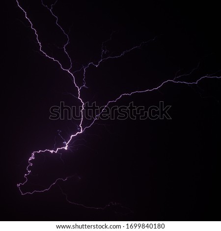 Lightning in a Dark Sky