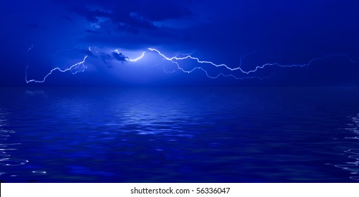 Lightning At Night With Reflection In A Water