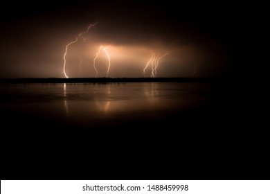 Lightning On The River At Night