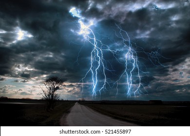 Lightning Storm Over Asphalt Road