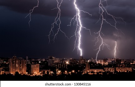 lightning storm over city - Powered by Shutterstock