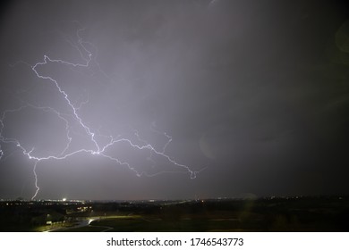 Lightning Storm Over A Small City In Kansas