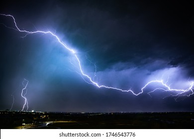 Lightning Storm Over A Small City In Kansas