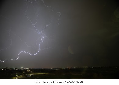 Lightning Storm Over A Small City In Kansas