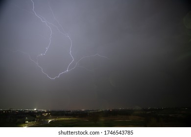 Lightning Storm Over A Small City In Kansas