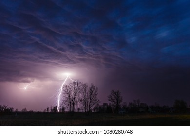Lightning strike under dramatic sky