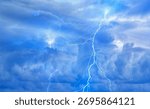 Lightning strikes between stormy clouds.