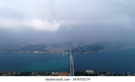 Lightning Strikes Over The Istanbul Bosphorus Bridge. Istanbul City Landscape. 4K Drone Footage In Turkey.