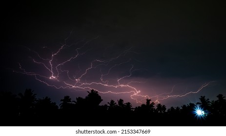 Lightning, Thunderbolt, Thunderstorm In The Night Sky In The Indian Village