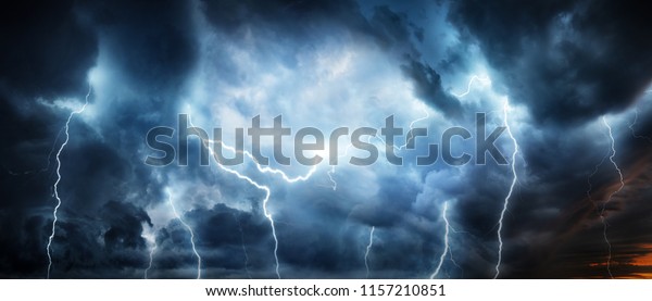 Lightning thunderstorm flash over the night sky. Concept\
on topic weather, cataclysms (hurricane, Typhoon, tornado, storm)\

