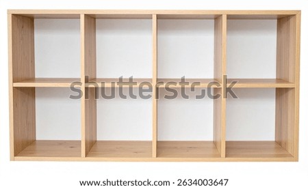 A lightoak, ninecube shelf unit stands empty against a white background. Its a simple, versatile storage solution for any room.