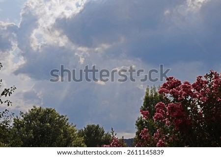 Lightrays coming from dark rainclouds 