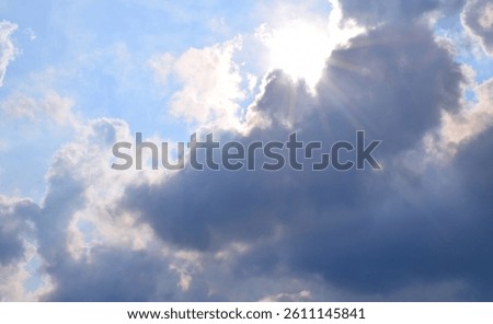 Lightrays coming from dark rainclouds 
