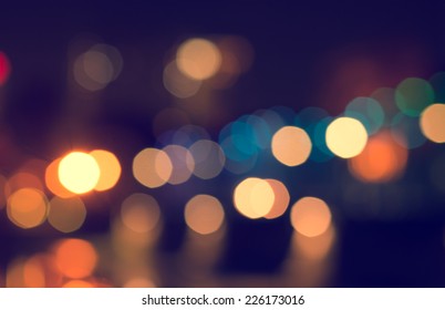 Lights Blurred Bokeh Background From Christmas Night Party For Your Design, Vintage Or Retro Color Toned 