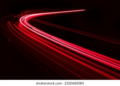 lights of cars driving at night. long exposure - Shutterstock ID 2320685085