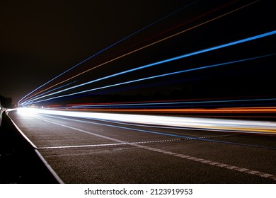 lights of cars with night. long exposure - Shutterstock ID 2123919953