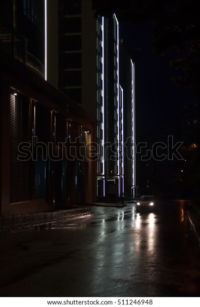Lights of the\
city at night in the rain.\
Urban