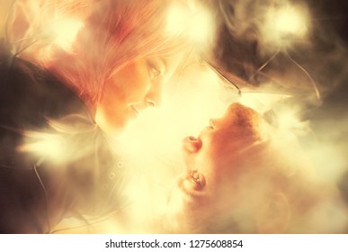 The lights of the electric garland illuminate the couple in love - Powered by Shutterstock