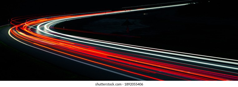 lights of moving cars at night. long exposure - Shutterstock ID 1892055406