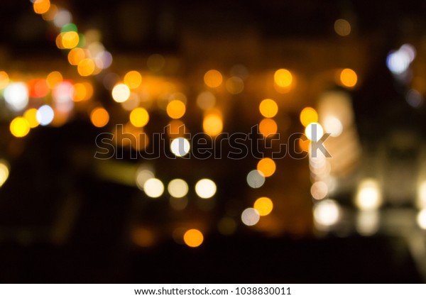 Lights of the old city from the height of the\
flight - at night, bokeh