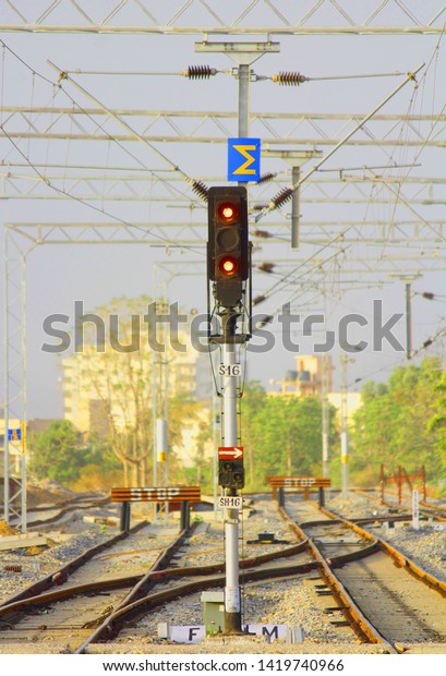 lights on railway station\
and tracks