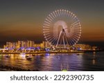 Lights on structure of Ain Dubai Observation Wheel on BlueWaters Island at sunset