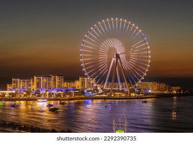 Lights on structure of Ain Dubai Observation Wheel on BlueWaters Island at sunset - Powered by Shutterstock