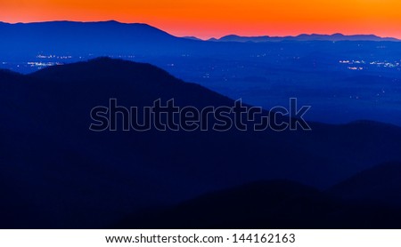 Lights in the Shenandoah Valley and ridges of the Appalachian Mountains, seen after sunset from Blackrock Summit in Shenandoah National Park, Virginia.