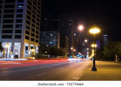 Lights Of A Summer Night In Chicago City Downtown Street, Long Exposure Car Trails