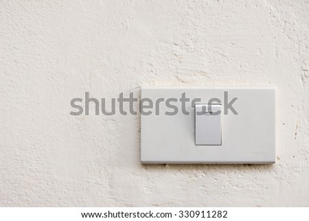 Lightswitch on concrete wall