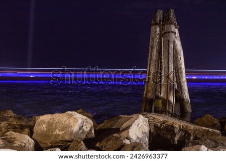 Lighttrails in Venice with docking and rocks