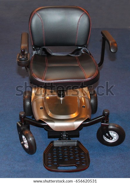 A Lightweight Disability Four Wheeled\
Electric Wheelchair.