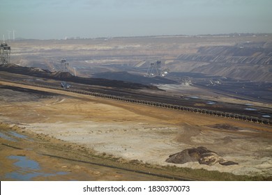 Lignite Brown Coal Surface Mining. Fossil Fuels In Garzweiler, Germany. Rhein-Braun Concept Foto For Energy Sector.