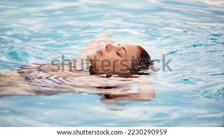 Similar – Image, Stock Photo Content woman swimming in rippling sea